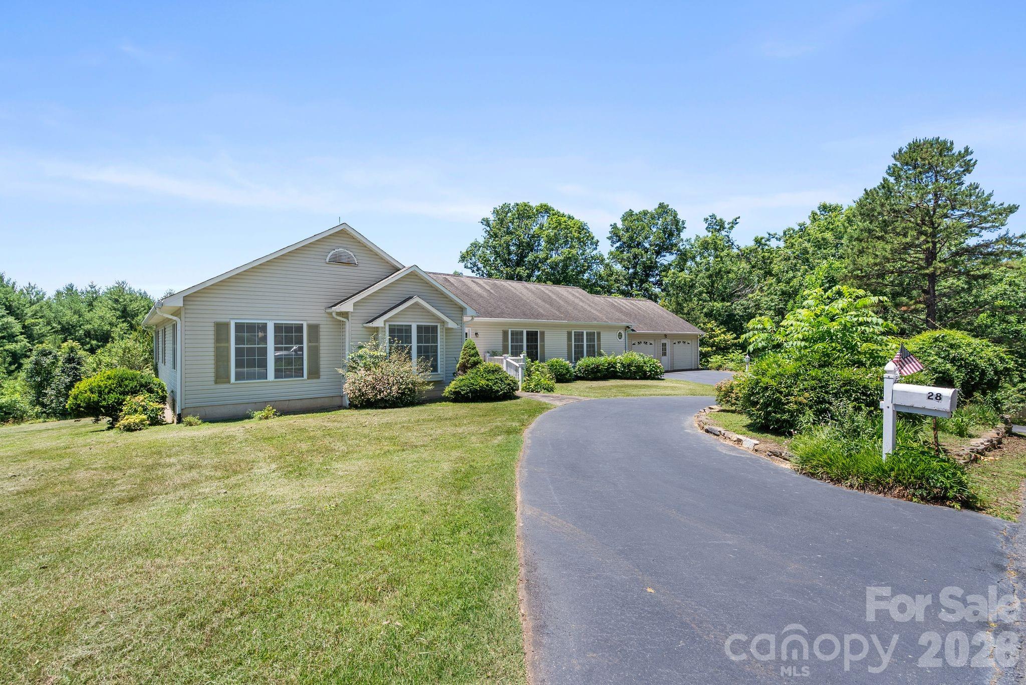 Circular driveway provides plenty of parking. - 28 Song Bird Lane, Weaverville