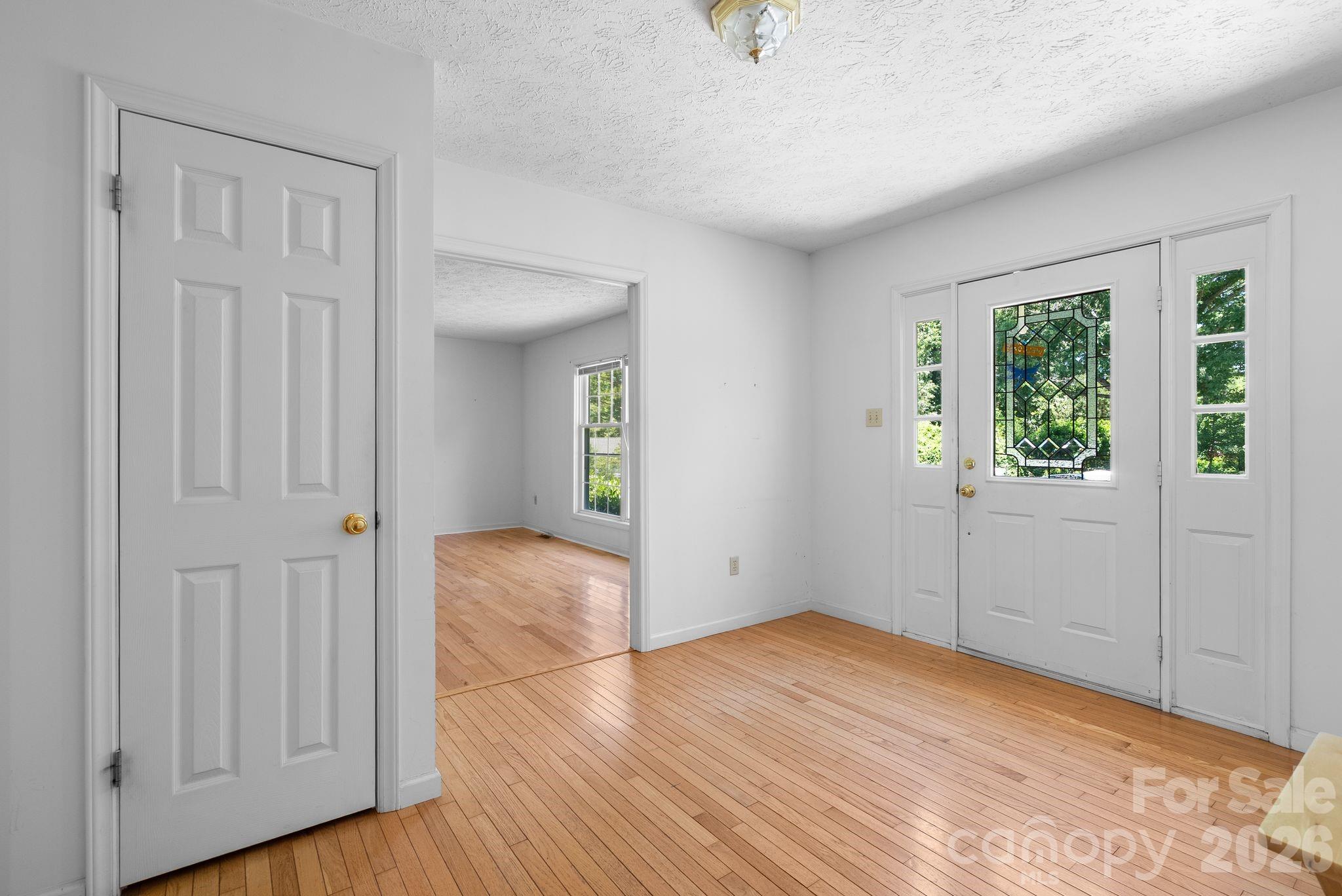 Large entry foyer and coat closet. - 28 Song Bird Lane, Weaverville