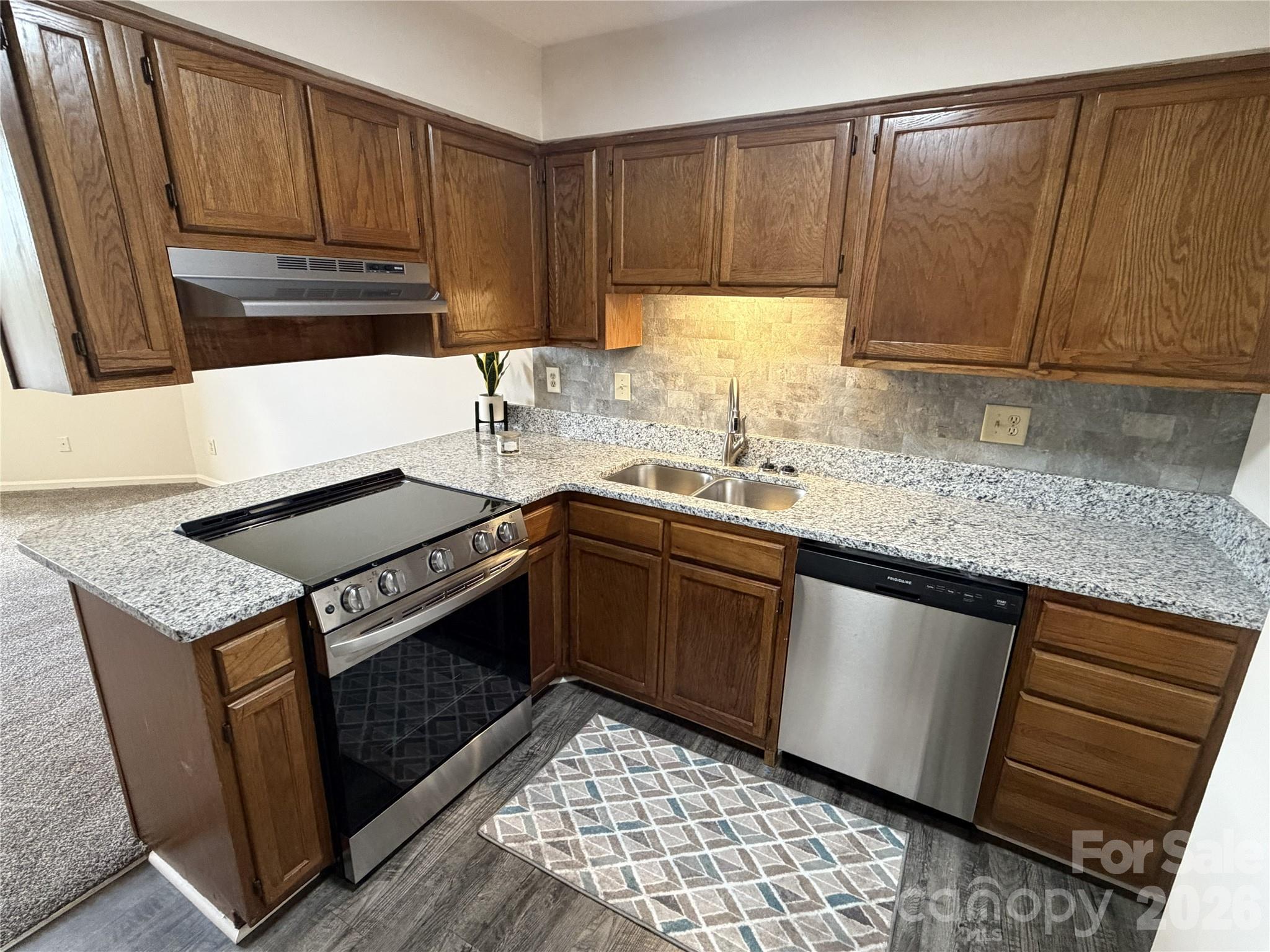 Condominium at 1 Buffalo Avenue NW, Concord, photo 2 of 32