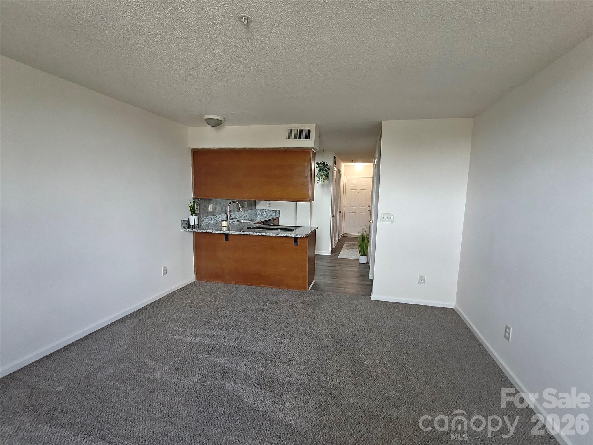 Condominium at 1 Buffalo Avenue NW, Concord, photo 7 of 32