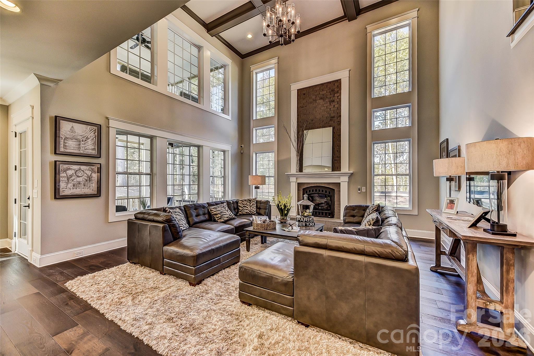 Representative PhotoFamily Room has abundant windows and High, Coffered Ceilings - 752 Lynderhill Lane, Matthews