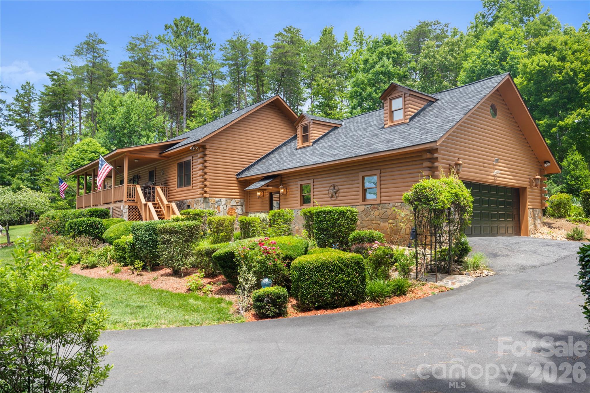 Pride of ownership shines throughout this remarkable yard. - 214 Harbor Ridge Drive, Connelly Springs