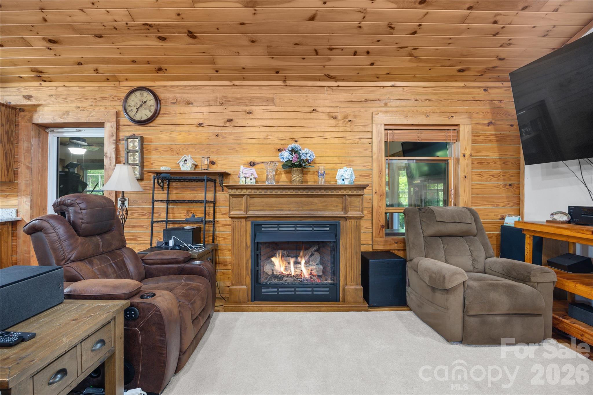 Stunning gas fireplace serves as the great room's centerpiece. - 214 Harbor Ridge Drive, Connelly Springs