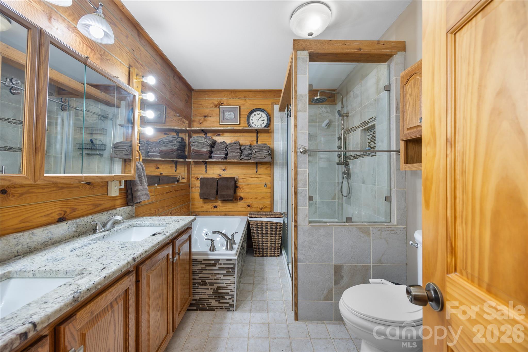 Custom en suite w/jetted tub and custom tile walk-in shower - 214 Harbor Ridge Drive, Connelly Springs