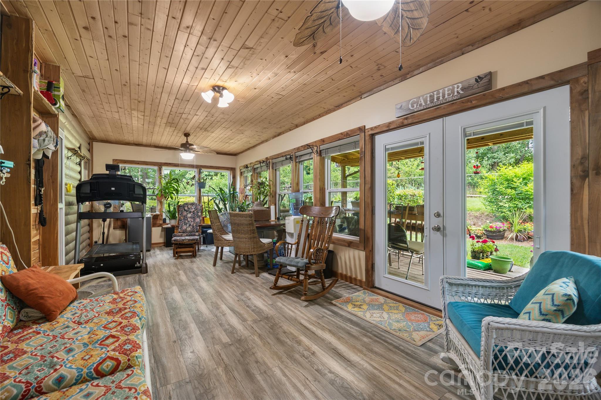 Charming sunroom filled with natural light. - 214 Harbor Ridge Drive, Connelly Springs