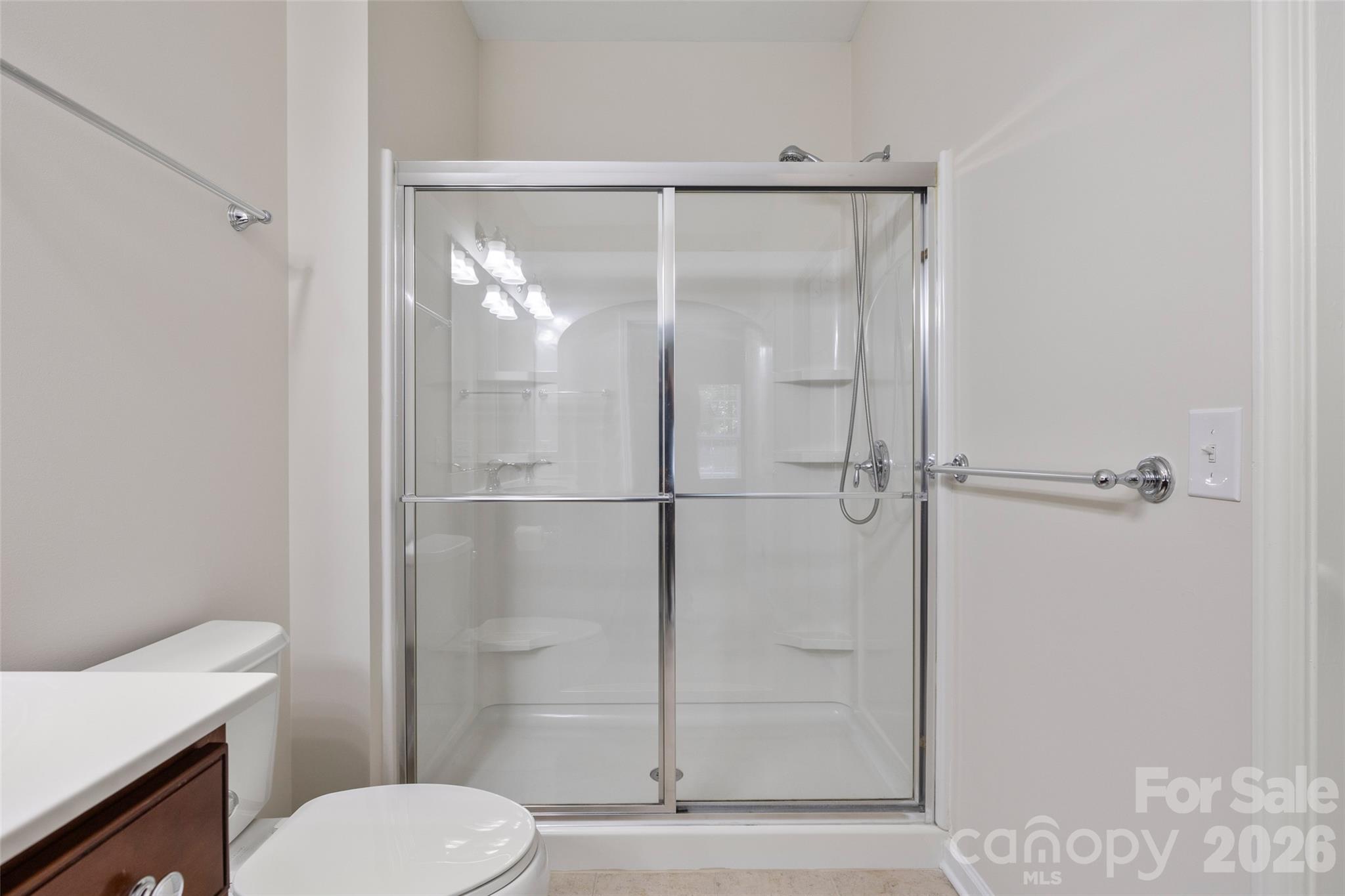 Walk-in shower & spacious walk-in closet in primary bath - 9015 Smokey Hill Lane, Indian Land