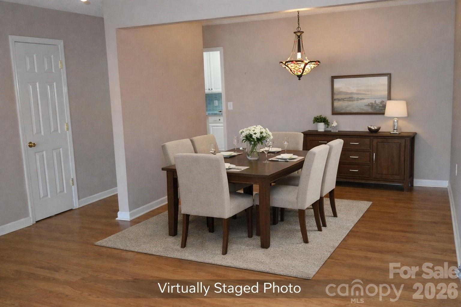 dining area virtually staged - 407 E Broad Street, Statesville