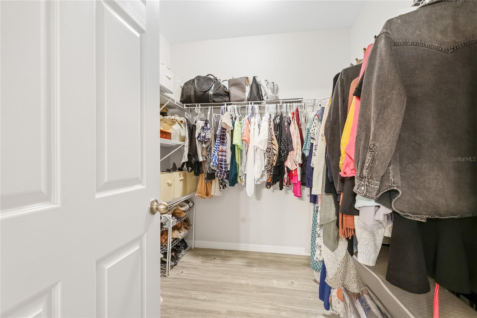 Second Large walk-in closet. - 24413 BANDONI PL, VENICE