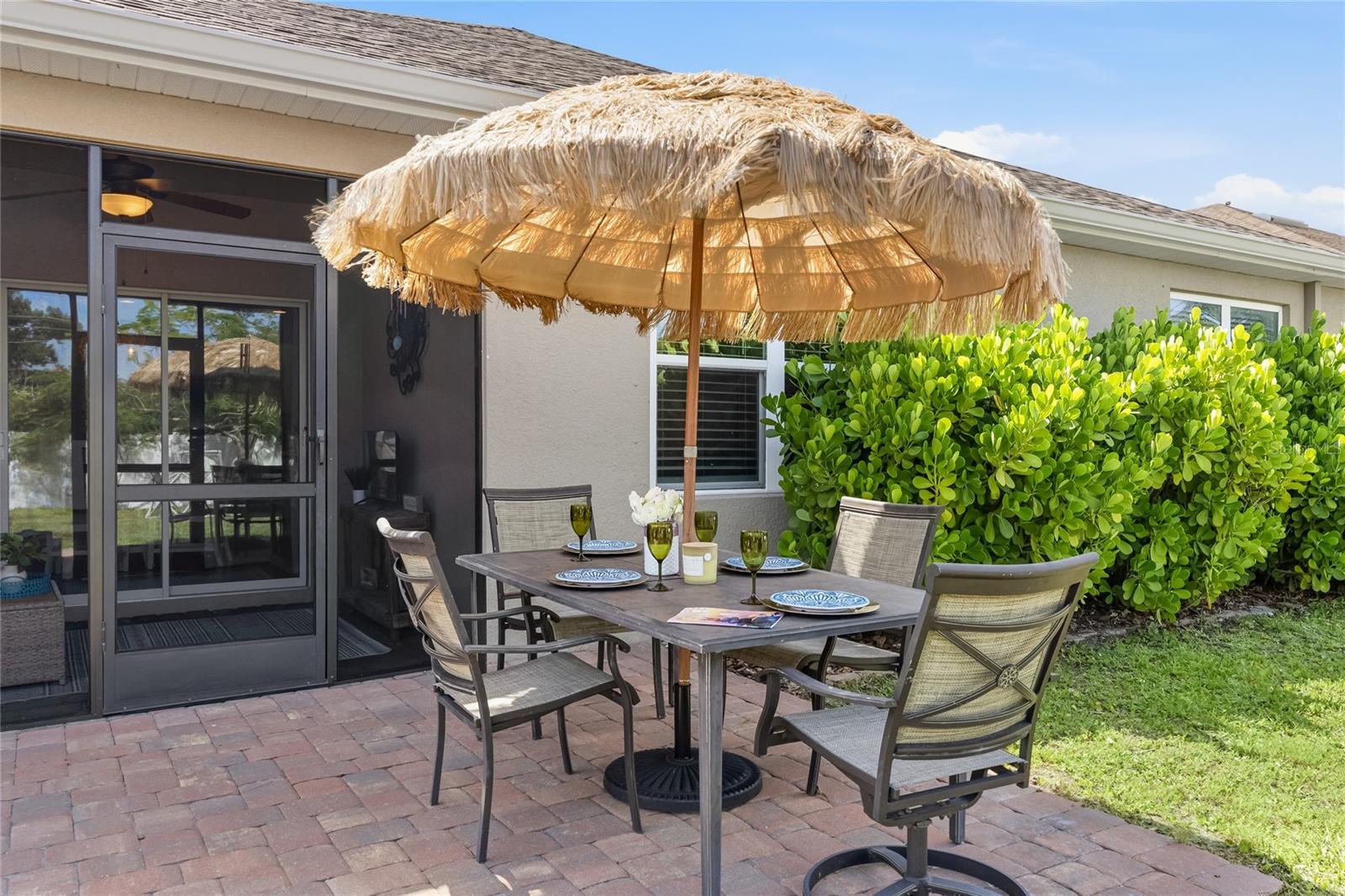 Paver Patio off the Lanai to extend the functional outdoor apace and a large complete fenced in yard. - 24413 BANDONI PL, VENICE