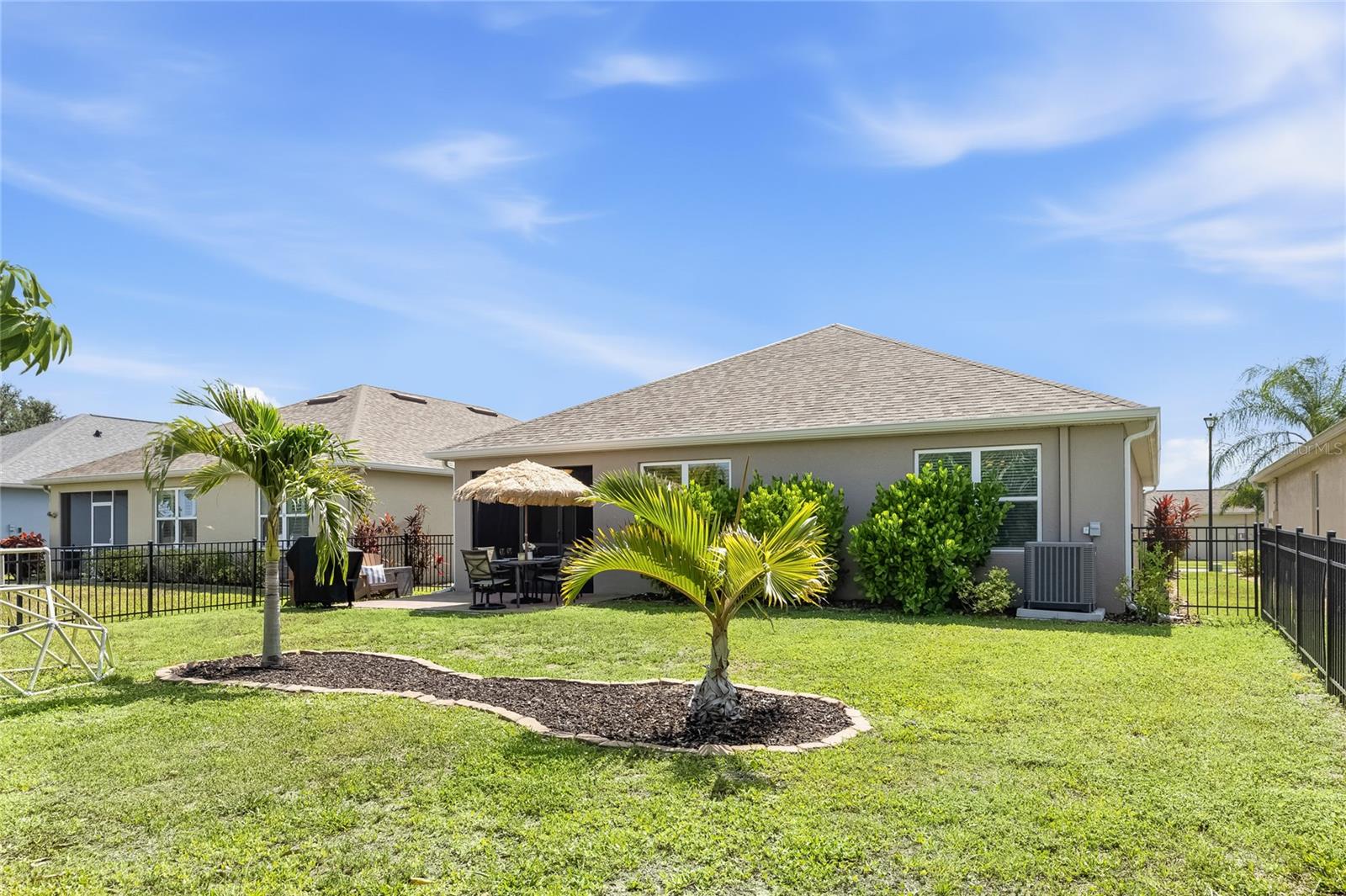 Paver Patio off the Lanai to extend the functional outdoor apace and a large complete fenced in yard. - 24413 BANDONI PL, VENICE