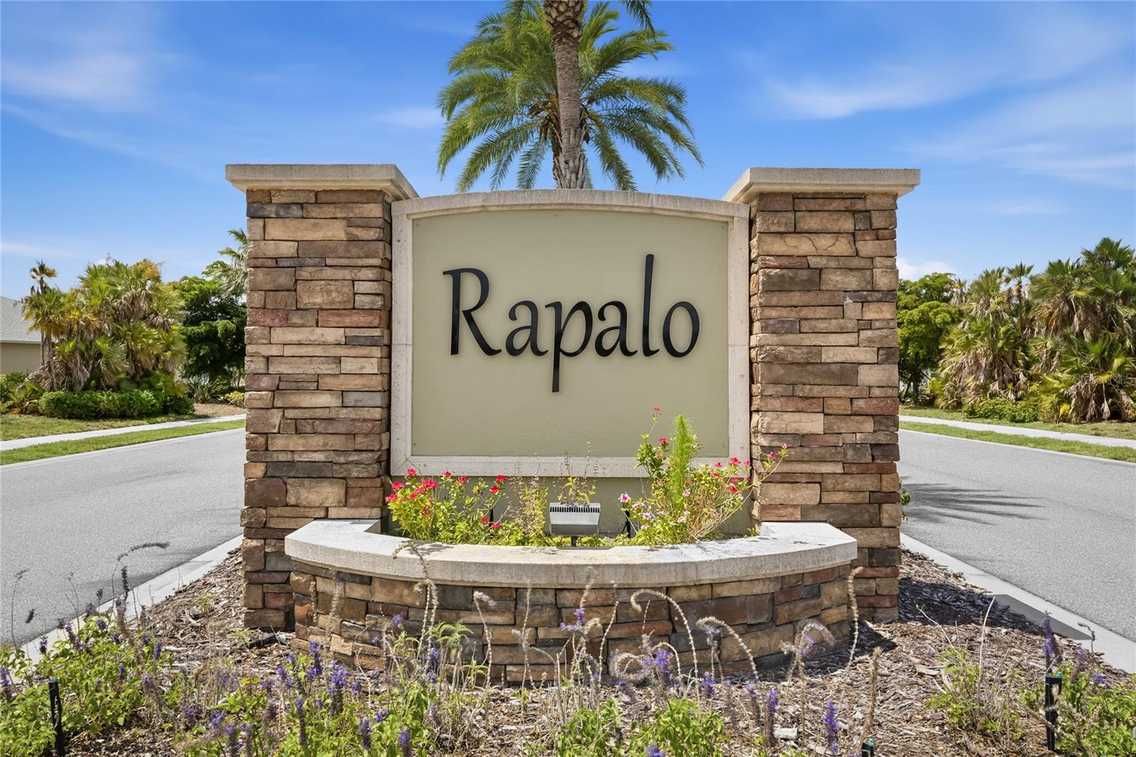 Entry sign into the Rapalo Community - 24413 BANDONI PL, VENICE