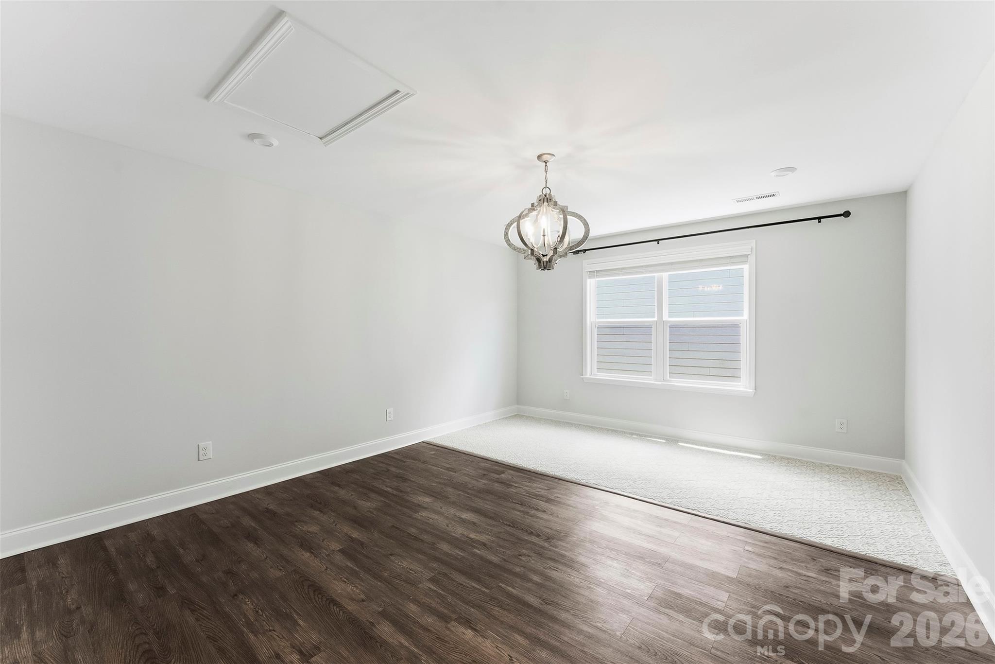 5th Bedroom/Bonus Room. Extra Large with fresh paint, upgraded lighting and large closet. - 1318 Poppy Way, Matthews