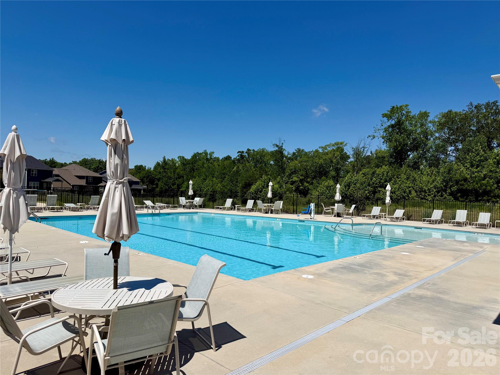 Another view of this community pool. Playground just beside the pool - 1318 Poppy Way, Matthews