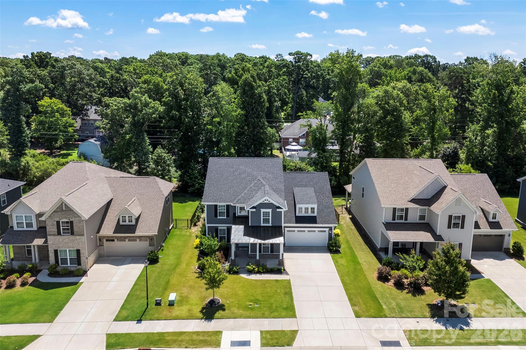 Aerial View of this home. Trees line the back of the property giving a nice buffer for privacy. - 1318 Poppy Way, Matthews