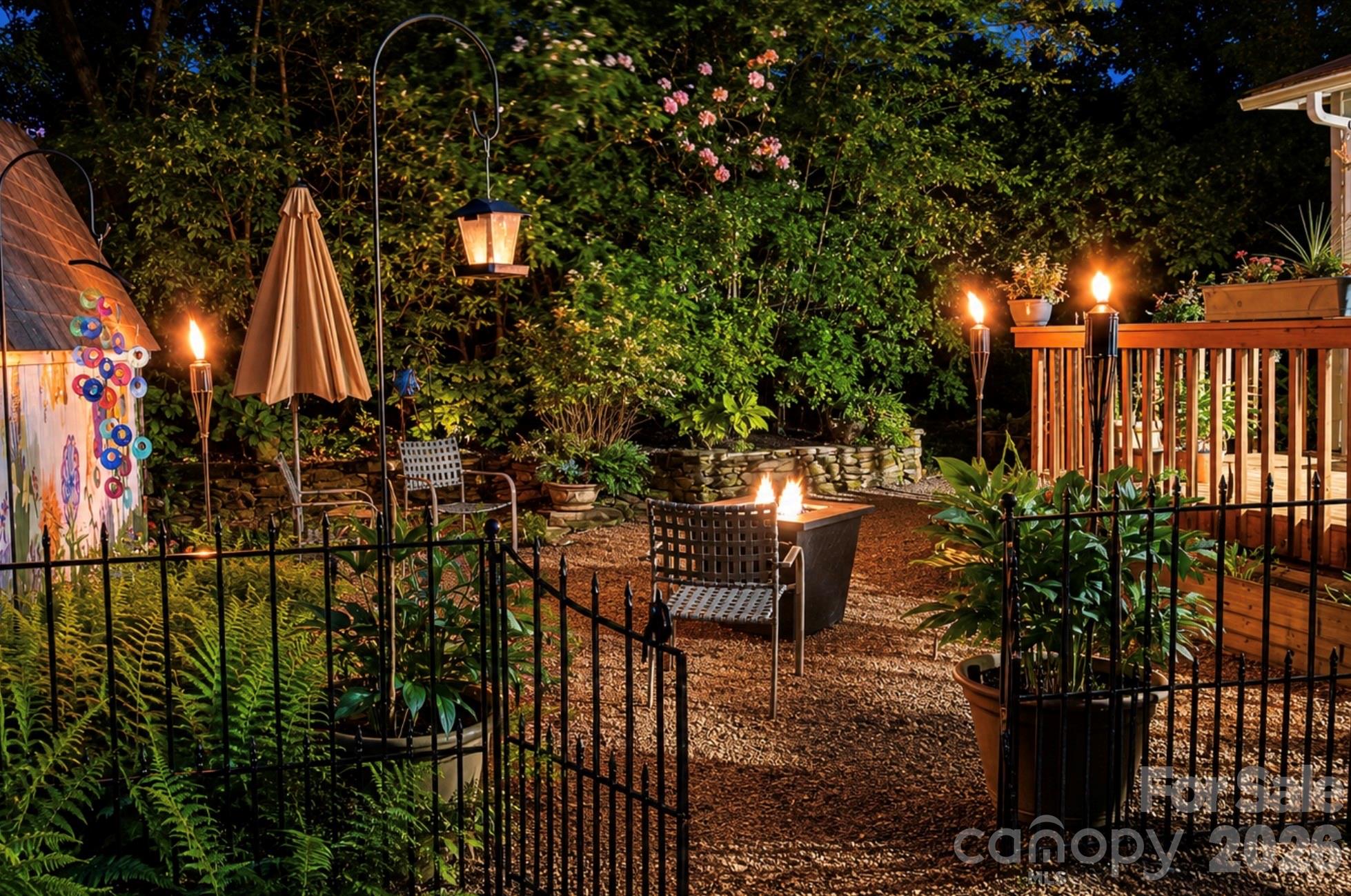 The outdoor living space is gorgeous, especially at night - 2698 Connestee Trail, Brevard