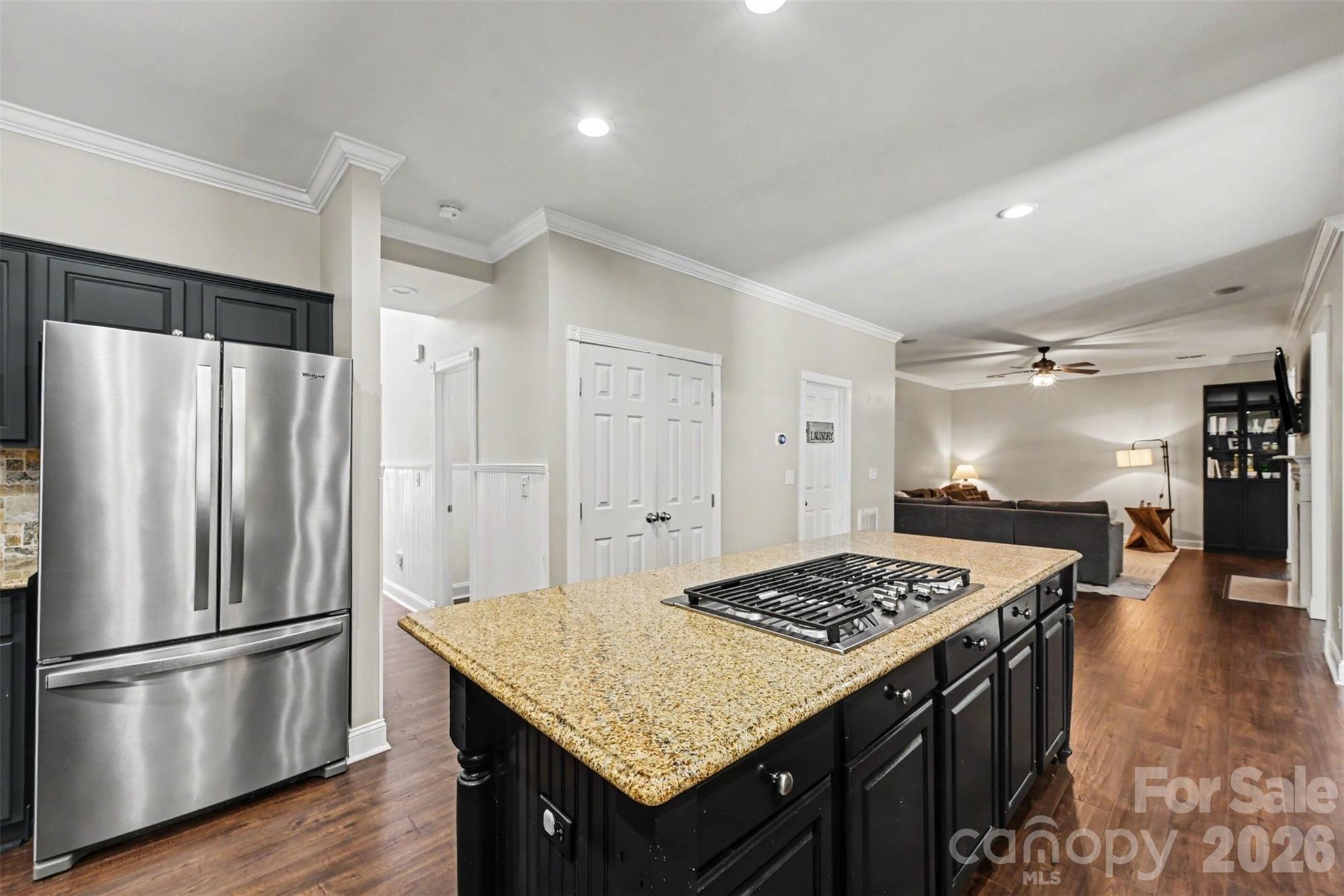 Kitchen opens to the family room area. - 2442 Smith Cove Road, Denver