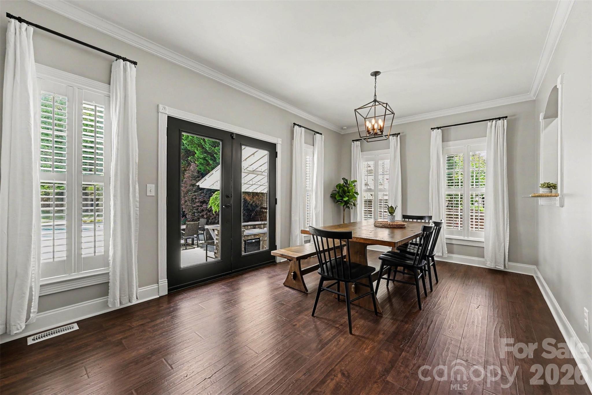 Flex space currently being used as another dining area. Opens to the outside oasis. There are multiple ways this room could be utilized. - 2442 Smith Cove Road, Denver