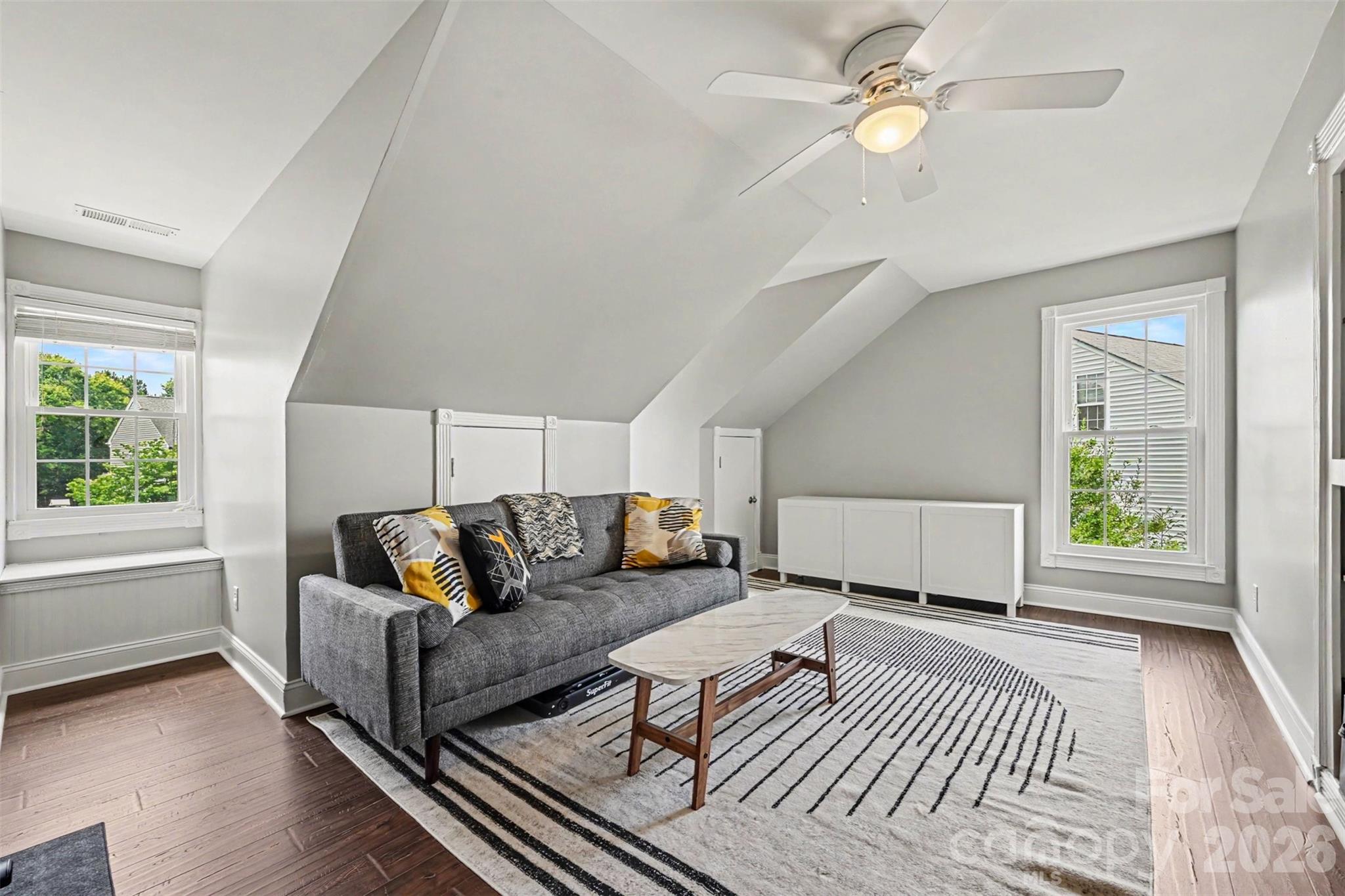 Bonus room area with dormer attic storage. - 2442 Smith Cove Road, Denver