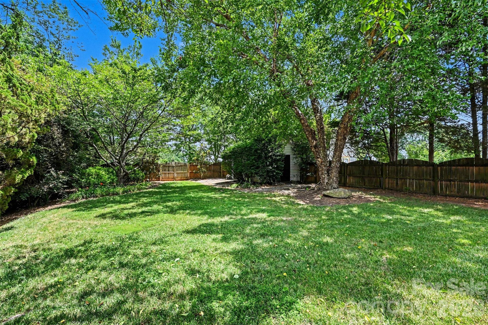 Shed in the back right corner is wired with electricity. - 2442 Smith Cove Road, Denver