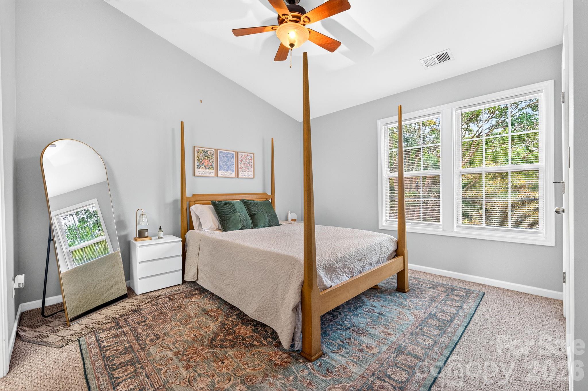Primary bedroom with vaulted ceiling - 6312 Rhodins Lane, Indian Land