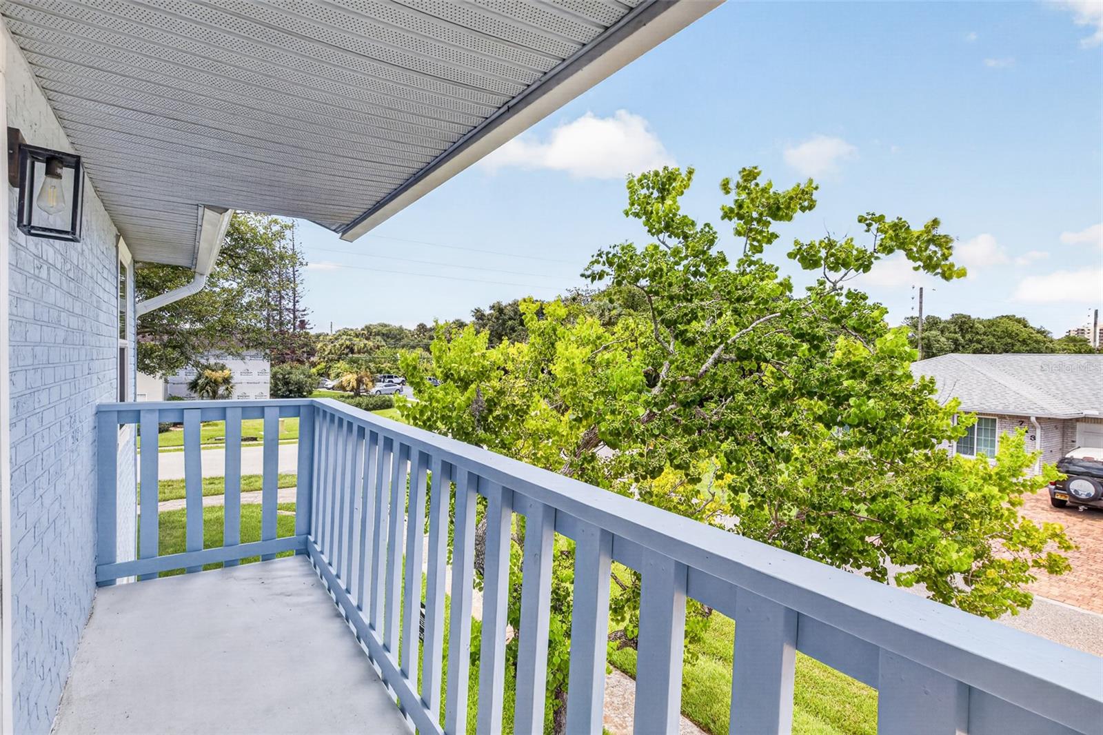 Front balcony with Primary suite access - 742 LAUREL BAY CIR, NEW SMYRNA BEACH