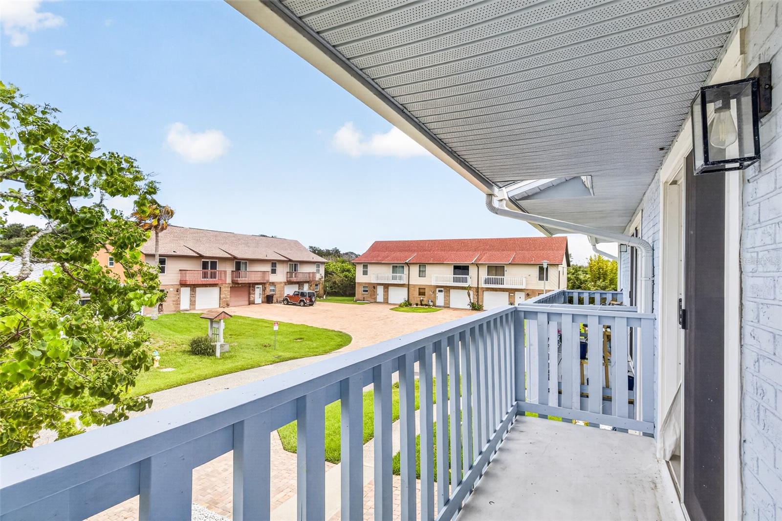 Front balcony with Primary suite access - 742 LAUREL BAY CIR, NEW SMYRNA BEACH