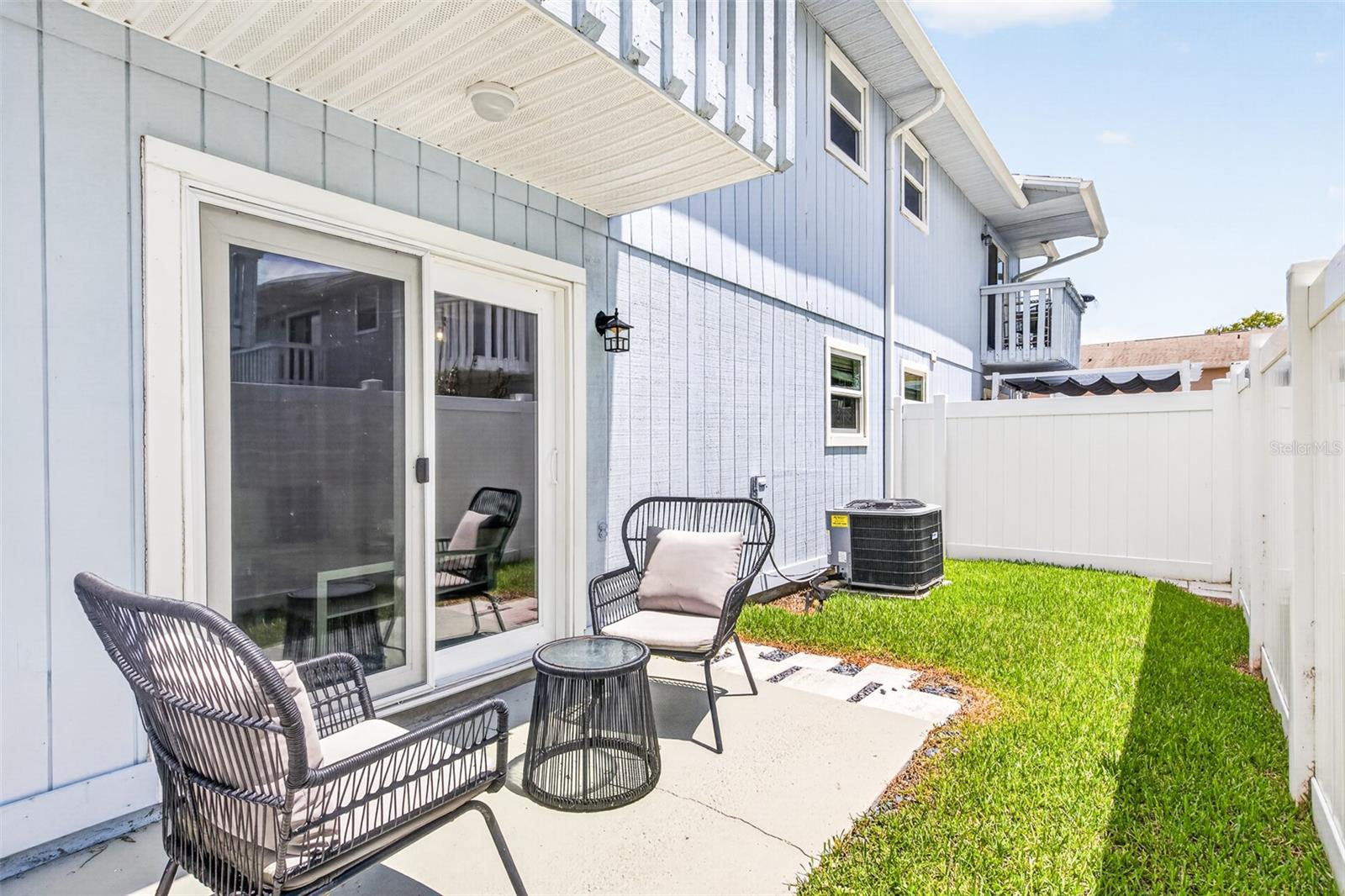 outside back patio fully fenced in - 742 LAUREL BAY CIR, NEW SMYRNA BEACH
