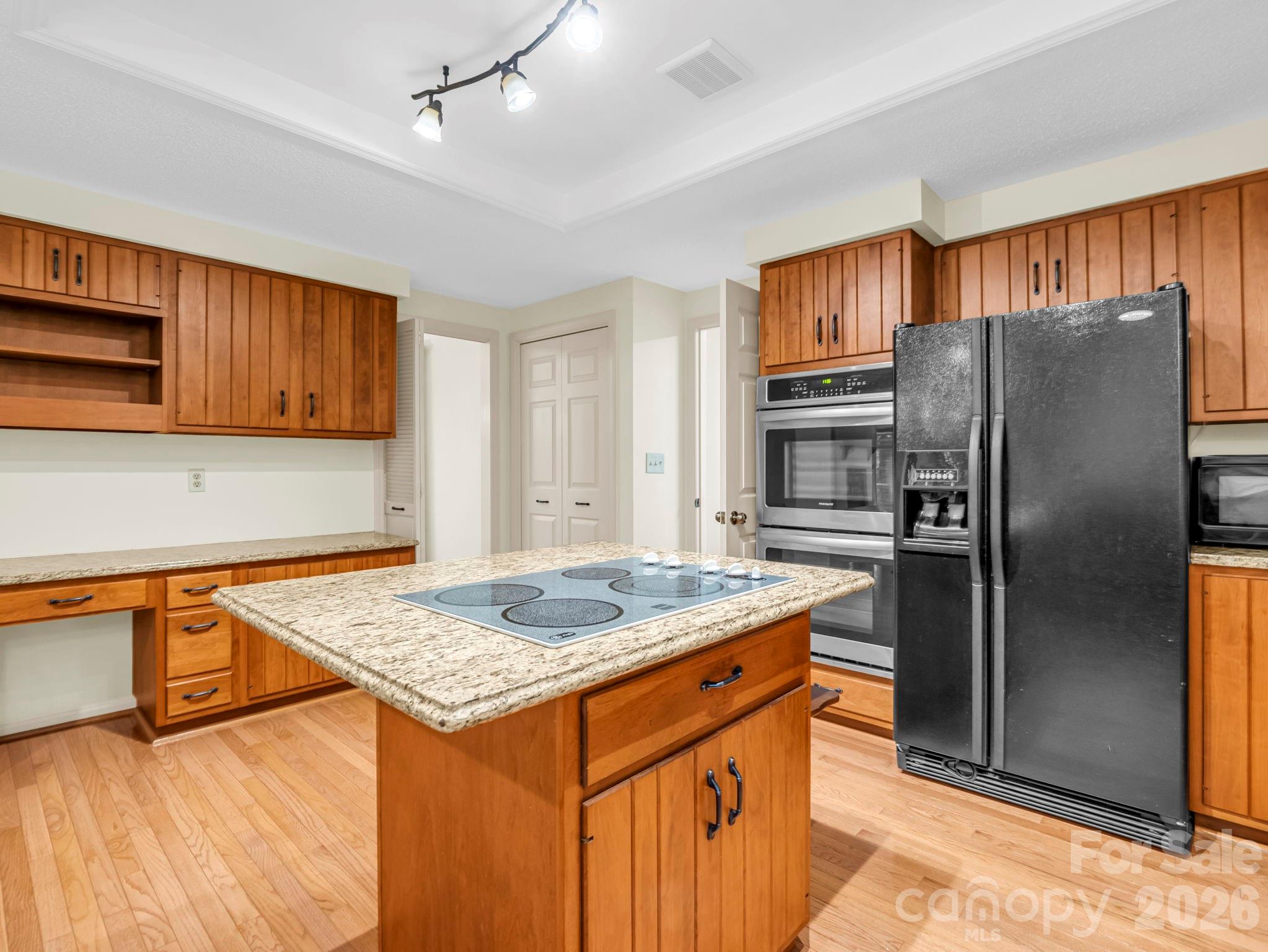 Kitchen, facing Dining Room, Mud & Laundry Room with 1/2 bath - 115 Woodhaven Drive, Hendersonville