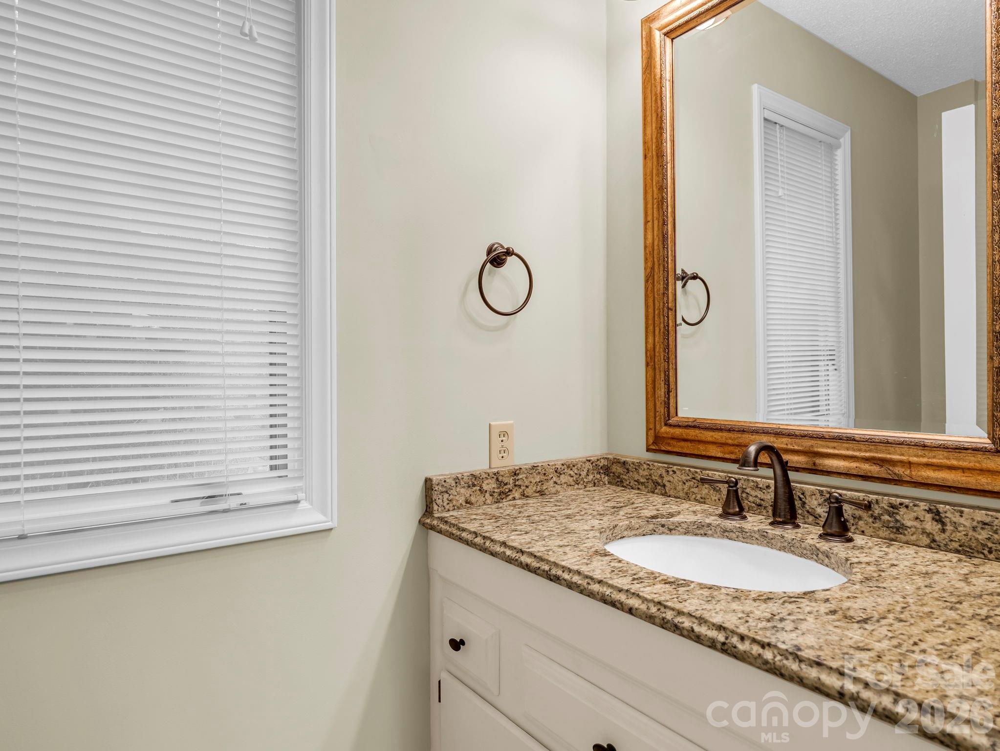 Half Bath, located in Laundry Room, adjacent to Kitchen - 115 Woodhaven Drive, Hendersonville