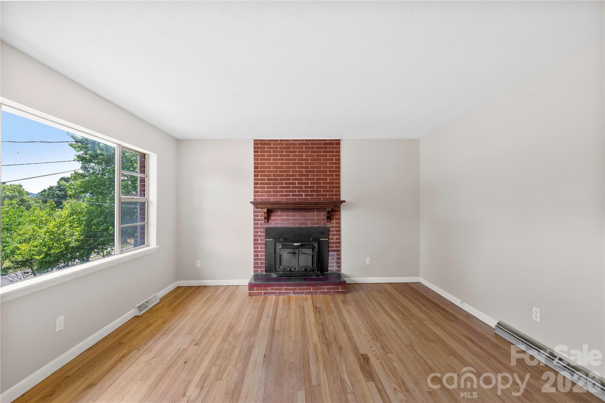 Single Family Residence at 309 Oak Hill Road, Candler, photo 7 of 39