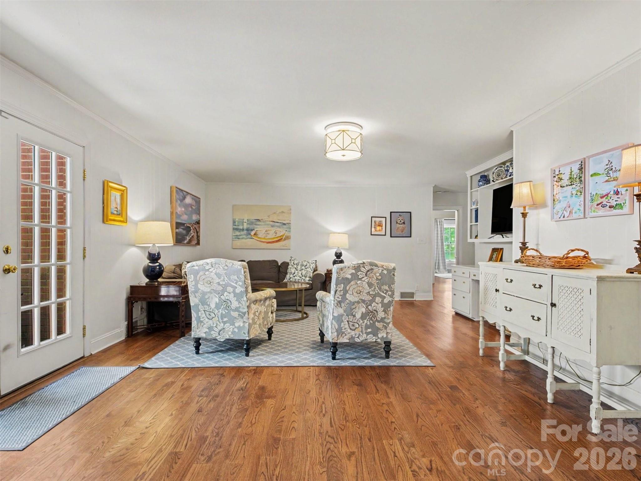 French doors frame the patio, the kitchen keeps you in the conversation - 441 Claymont Street SE, Concord
