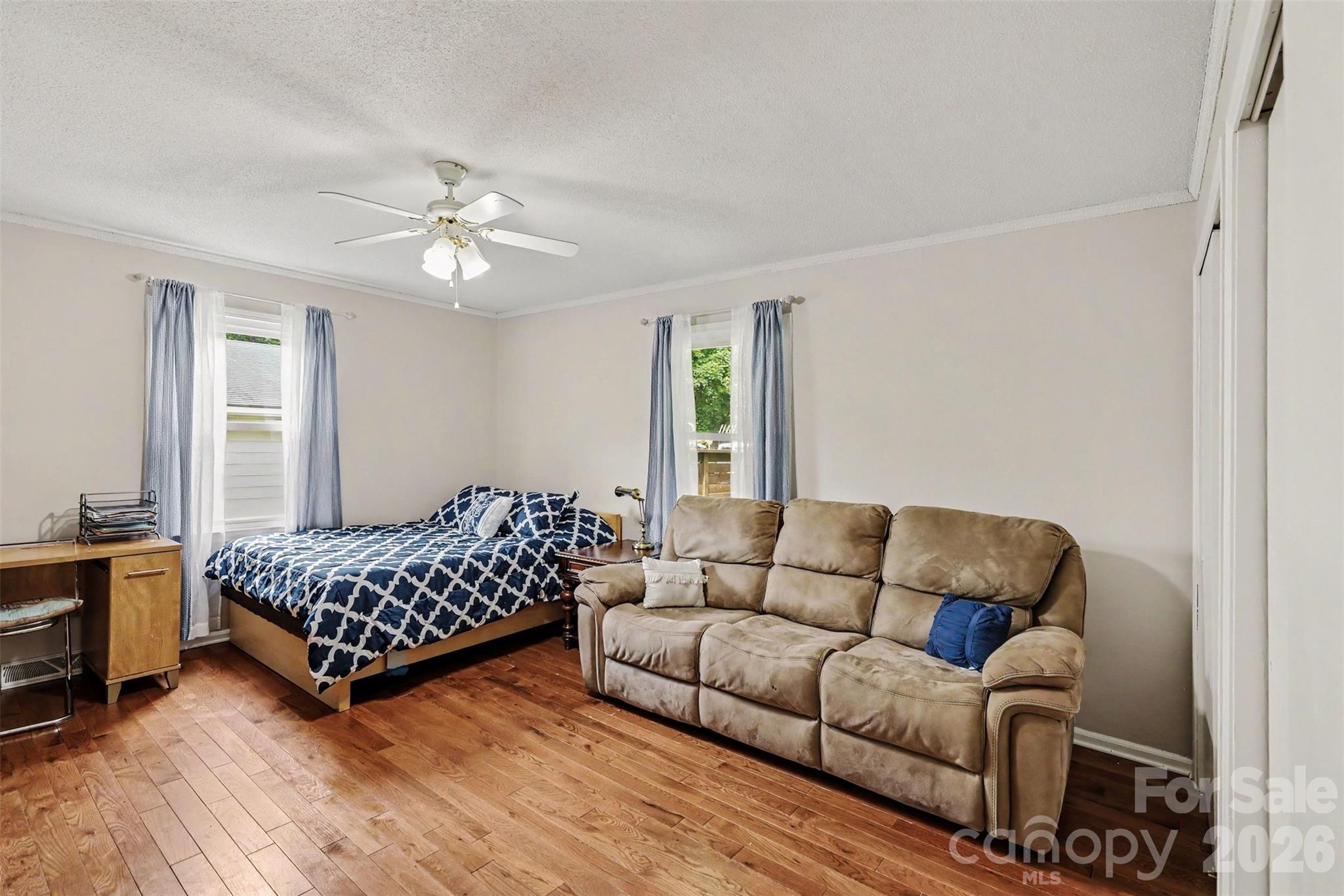 Second bedroom with hardwood floors and natural light - 1306 Mooresville Road, Kannapolis