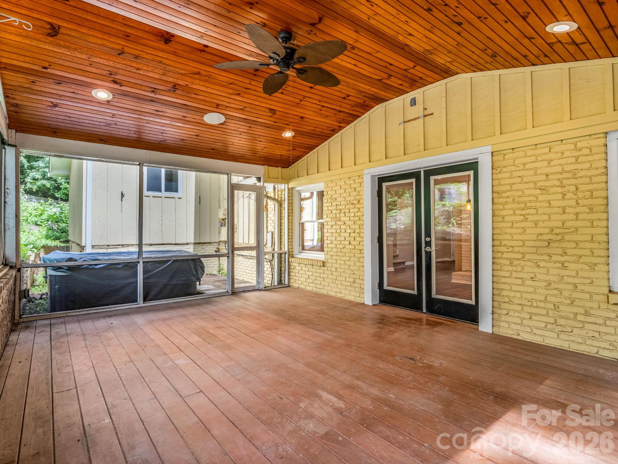 Screened porch off the main level off dining area - 111 Dogwood Drive, Black Mountain