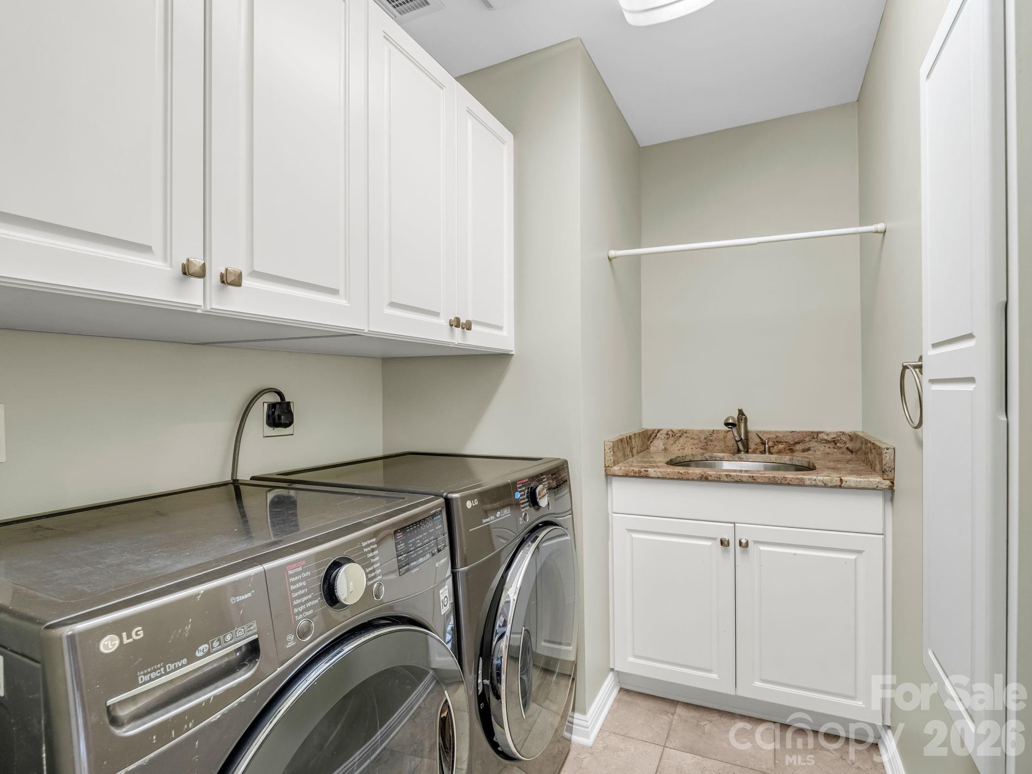 Laundry in the primary suite - 111 Dogwood Drive, Black Mountain
