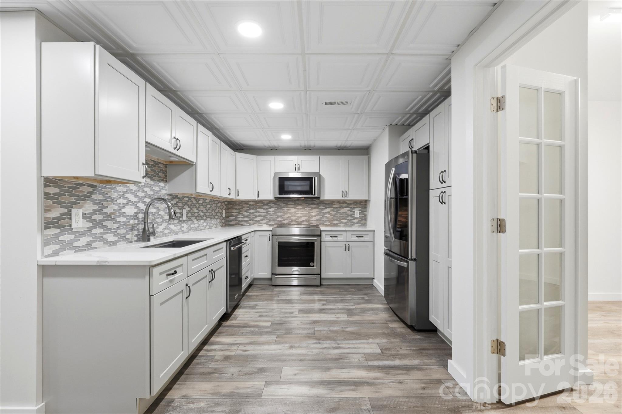 Lower level kitchen - 4639 Harbor View Terrace, Morganton
