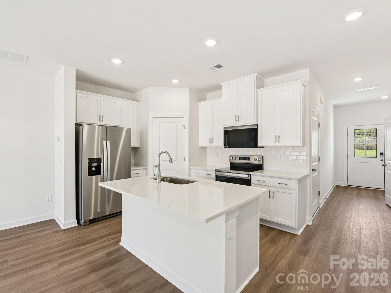 Photo is not of the actual home, but is an inspirational photo of builder’s model home and may depict options, furnishings, and/or decorator features that are not included - 1125 Rosetta Drive, Salisbury