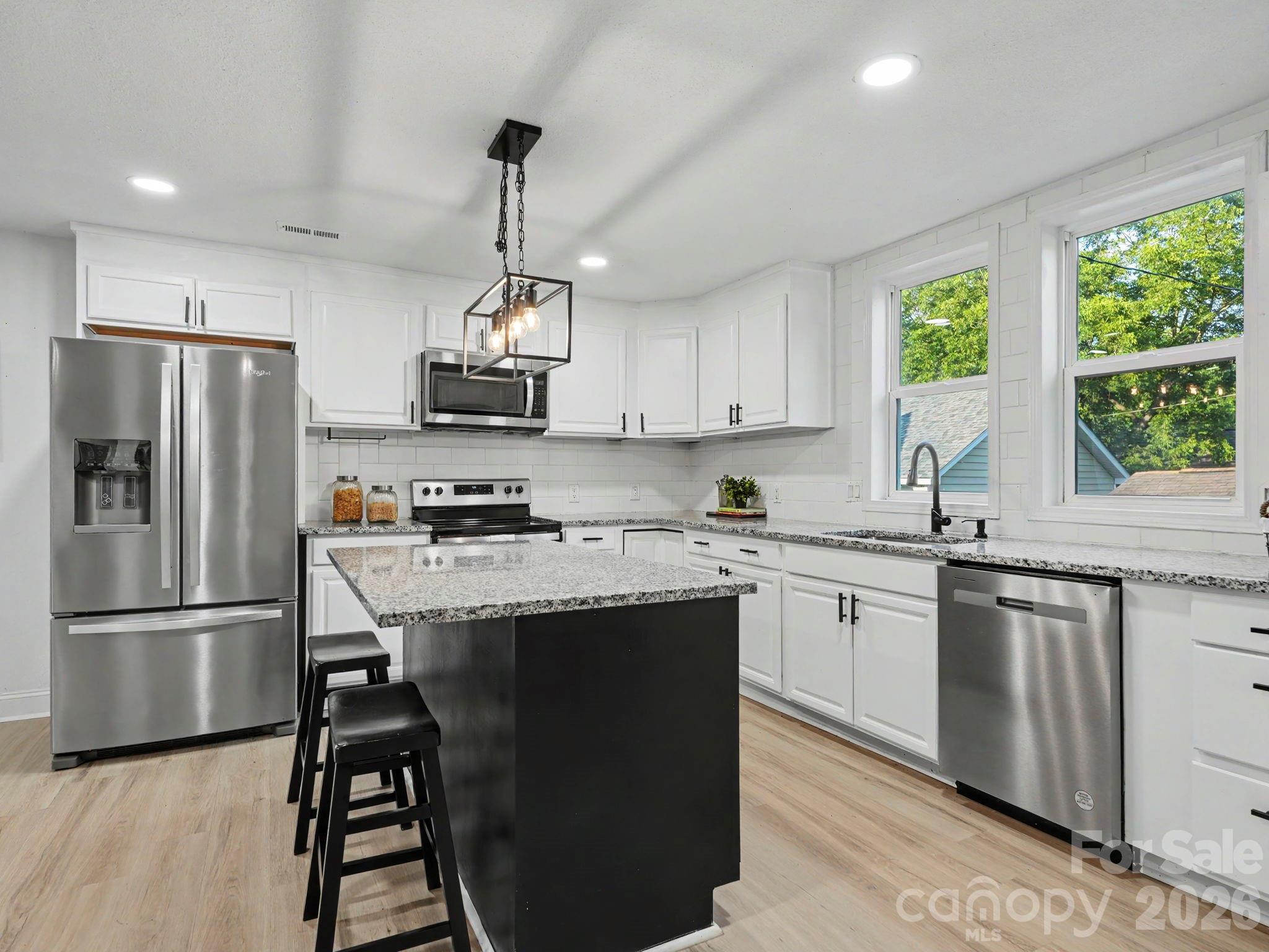 Single Family Residence at 607 Old Charlotte Road SW, Concord, photo 9 of 34