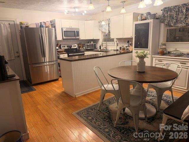 Single Family Residence at 1702 Cajah Mountain Road, Hudson, photo 4 of 35