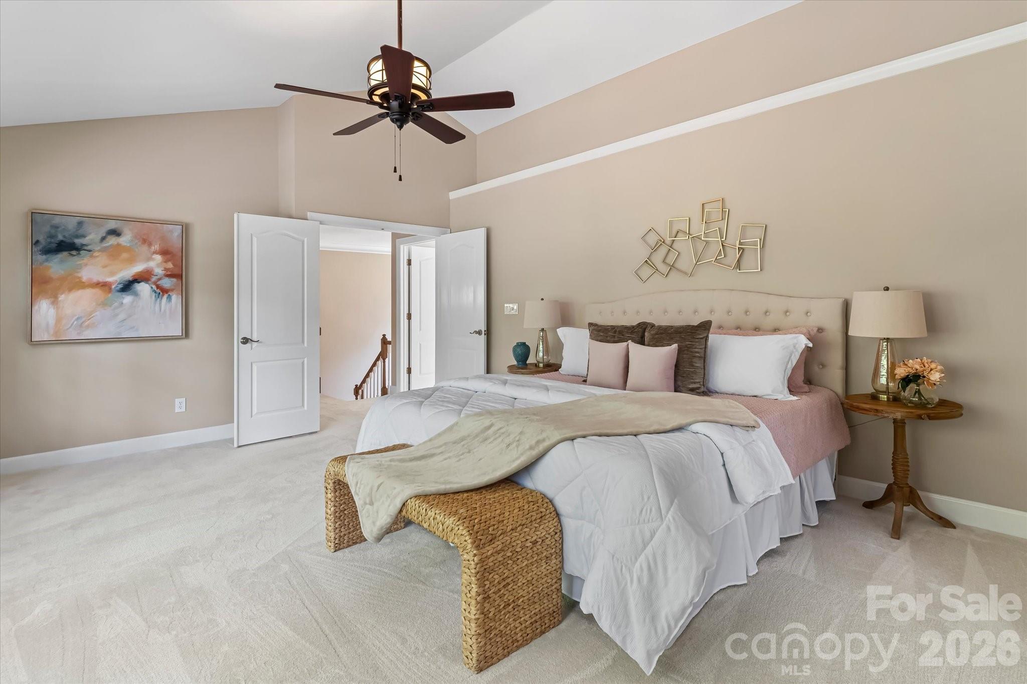 Vaulted ceilings in the Primary bedroom - 122 Lake Pine Road, Mooresville