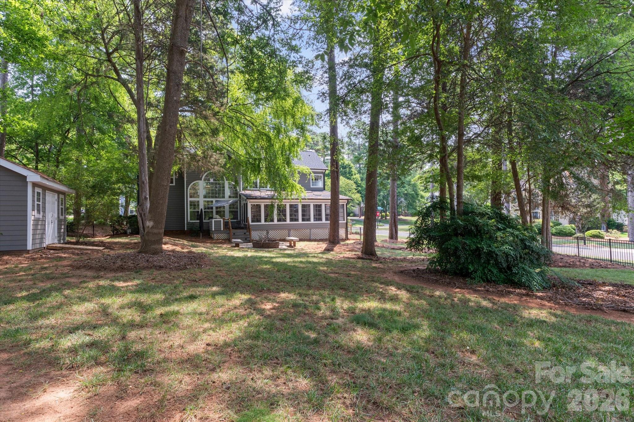 Large fenced yard with a shed - 122 Lake Pine Road, Mooresville