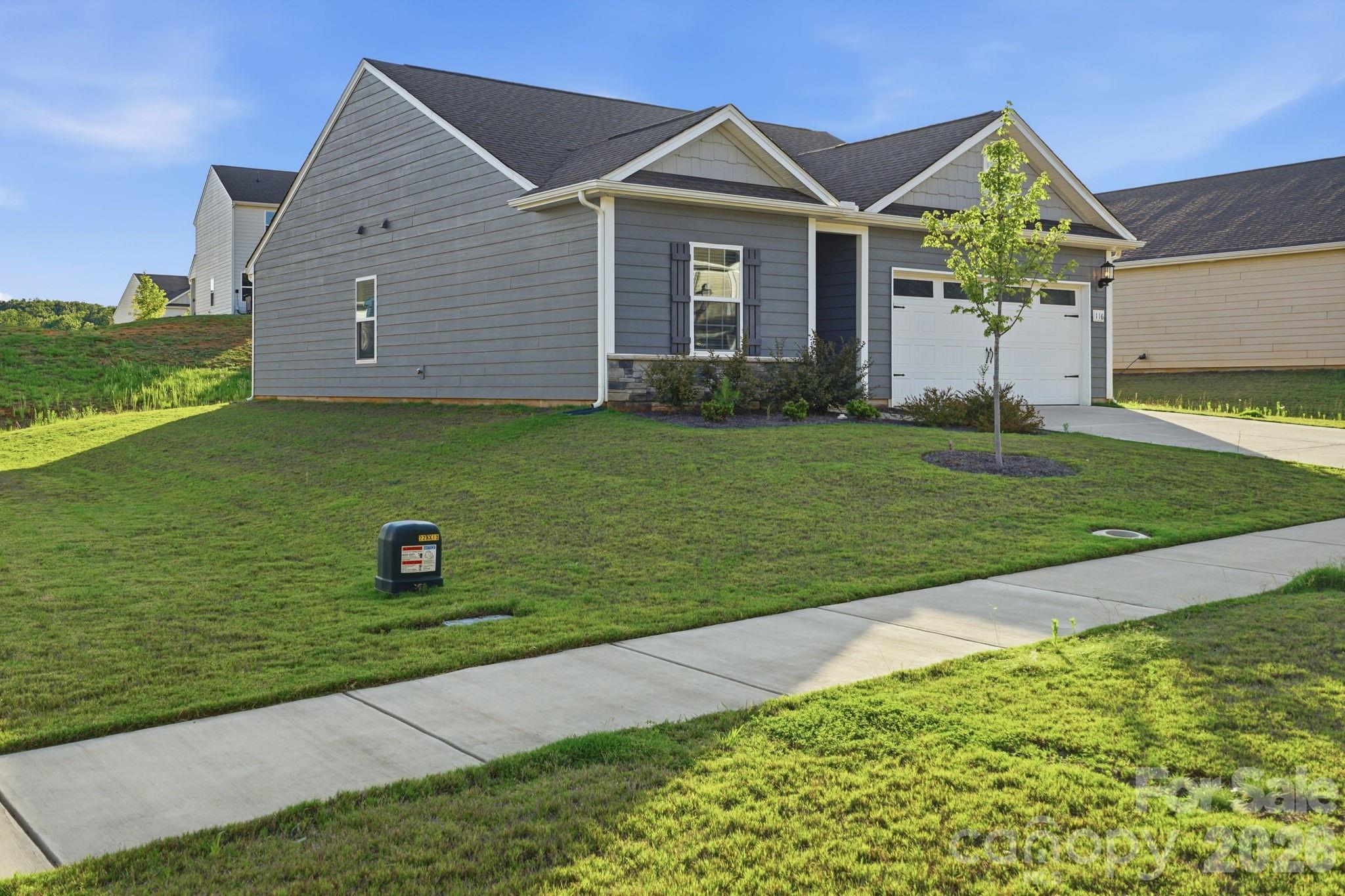 Single Family Residence at 116 S Sina Street, Troutman, photo 2 of 35