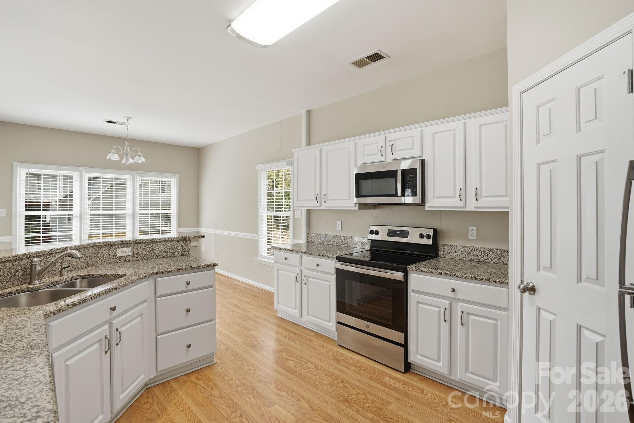 Single Family Residence at 15733 Berryfield Street, Huntersville, photo 19 of 46