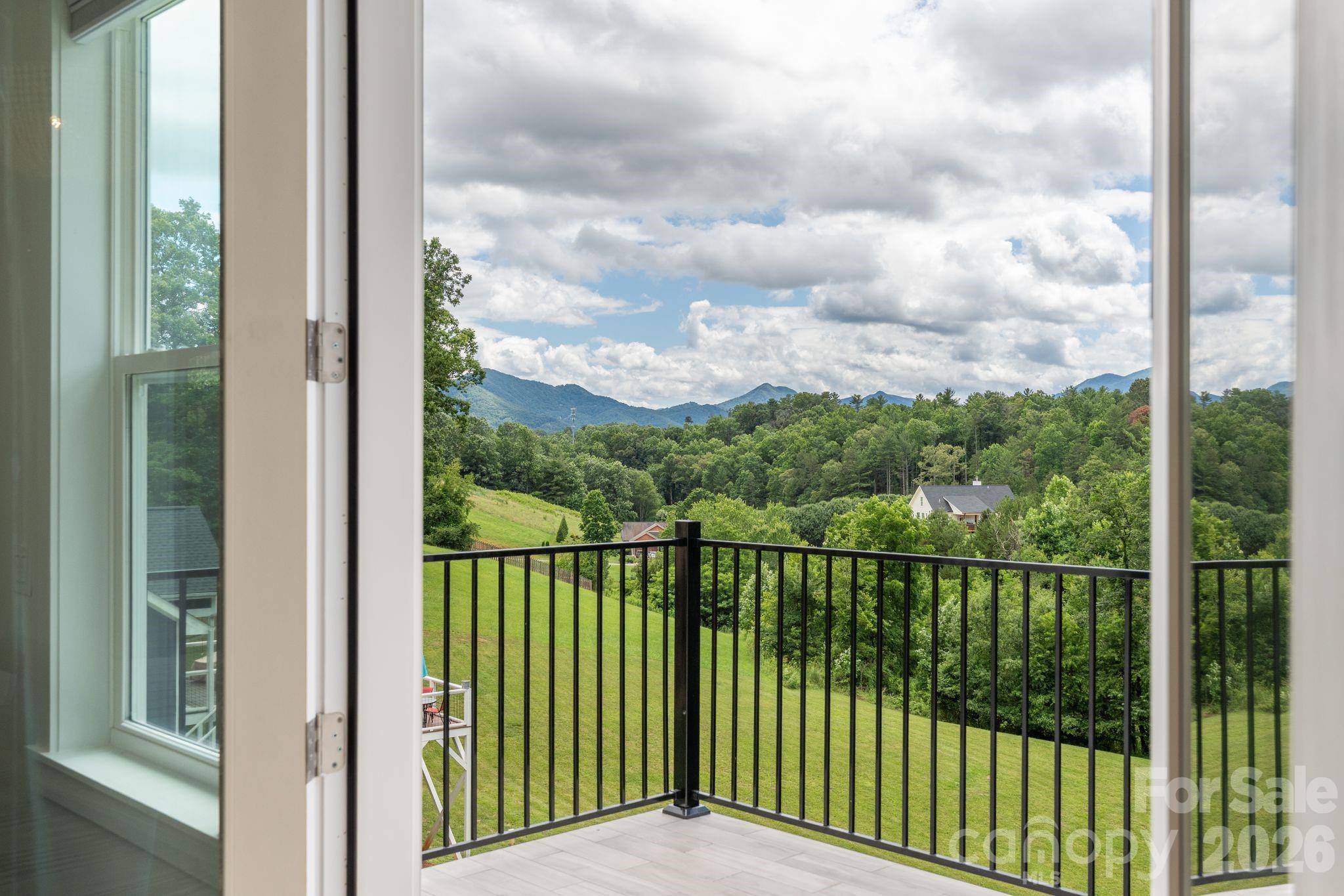French Doors from the Primary Bedroom to the deck - 7 Temujin Drive, Leicester