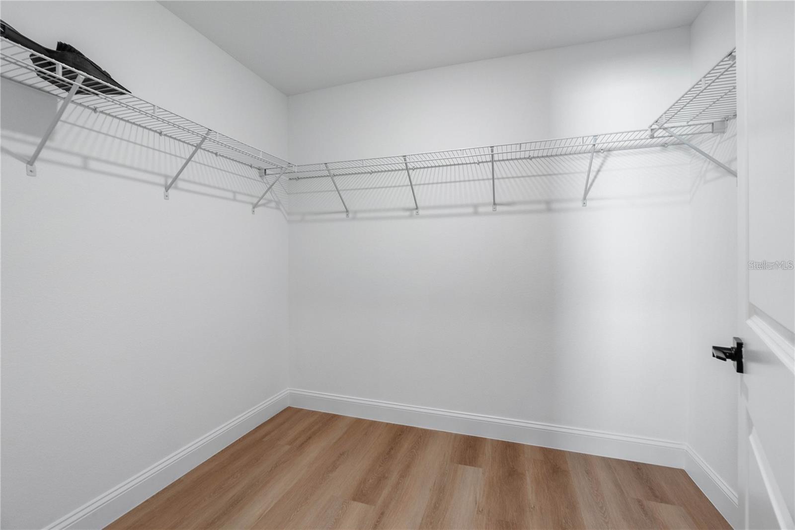 Primary Walk In Closet - 18 FLAMINGO DR, PALM COAST
