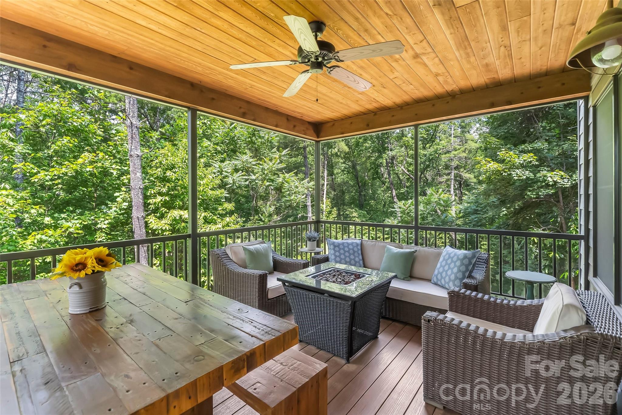 Screened outdoor deck off of the main floor - 4064 Dense Acre Trail, Nebo