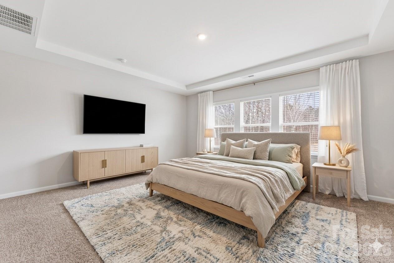 virtually staged primary bedroom - 346 W Waterlynn Road, Mooresville