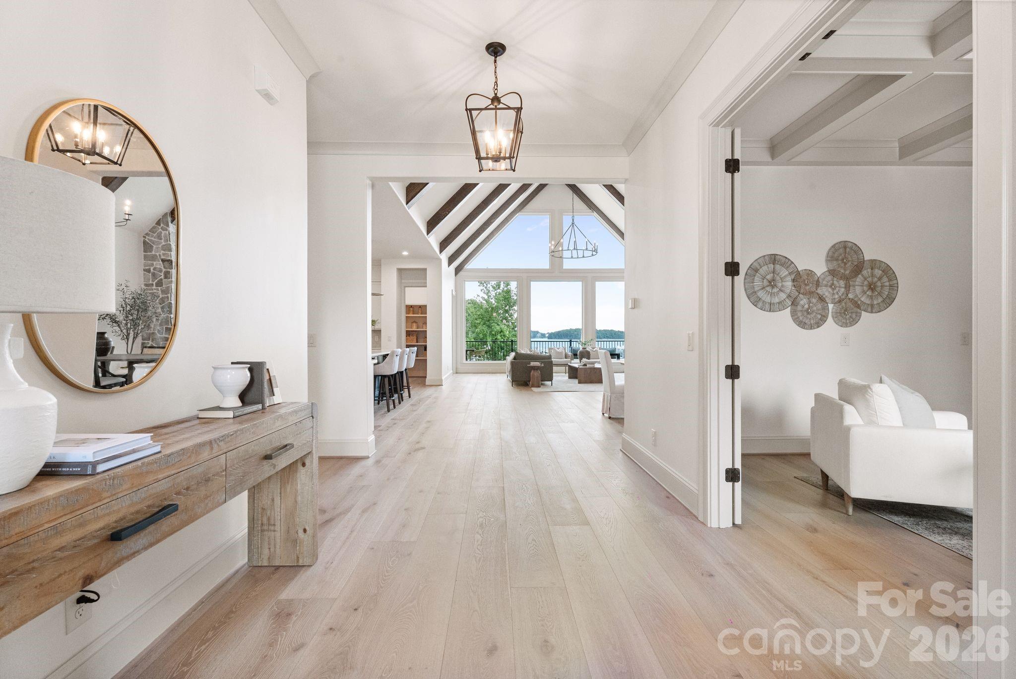 White oak floors and lake views greet you as you enter. - 2494 Primm Road, Denver