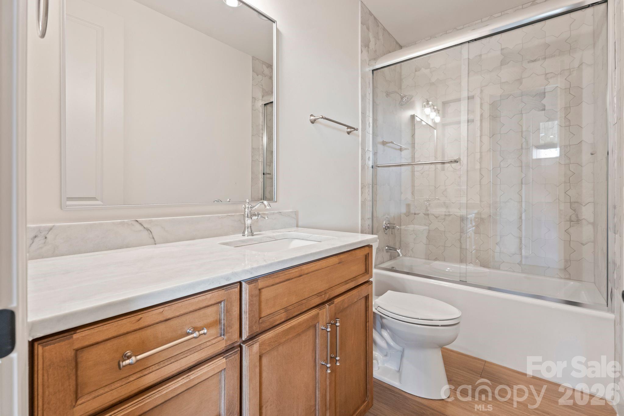 lower level full bath with easy access from pool area - 2494 Primm Road, Denver