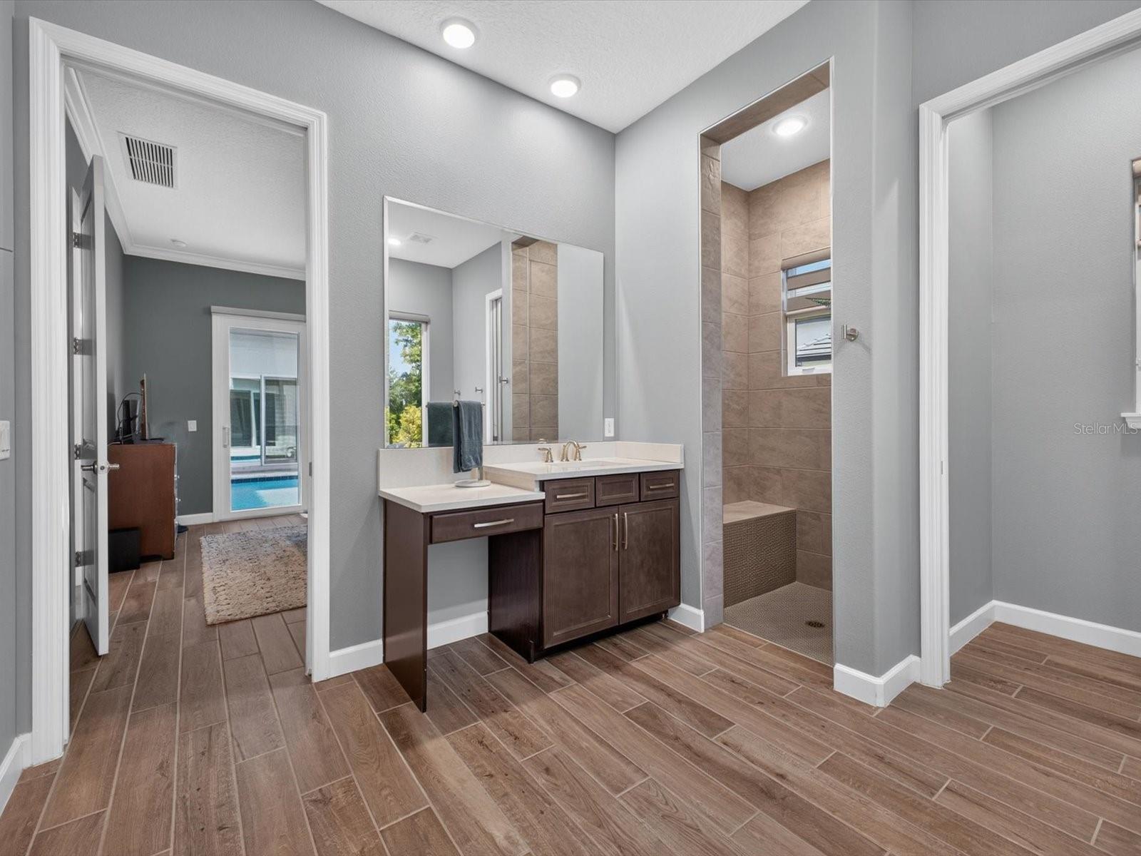 Primary suite has a luxurious bathroom - 196 HAMPTON LOOP, DAVENPORT