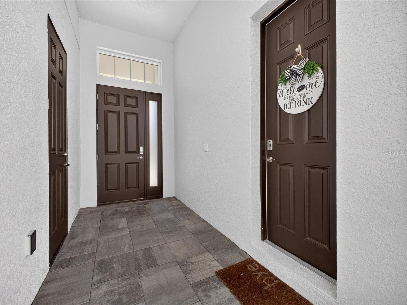 Looking to entry doorPool house entry on right - 196 HAMPTON LOOP, DAVENPORT